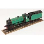 3.5 inch spirit fired model of a 4-6-0 locomotive and tender, finished in green and black and