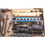 Two trays containing a collection of part built locomotives, started projects, etc, all appear 0