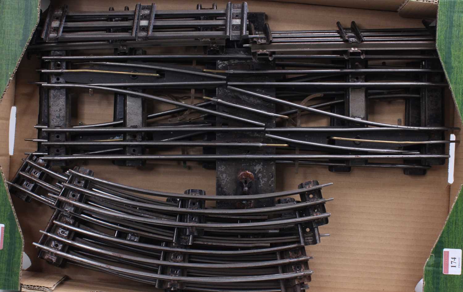 Hornby 0-gauge electric track: one each R/h & L/h crossovers, good positive action but a small