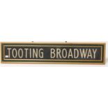 An original 1958 Tooting Broadway London Routemaster Bus sign, framed and glazed, length 112cm