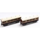 Two LNWR bogie coaches made by Carette in Germany for A.W.Gamage of Holborn, London, running