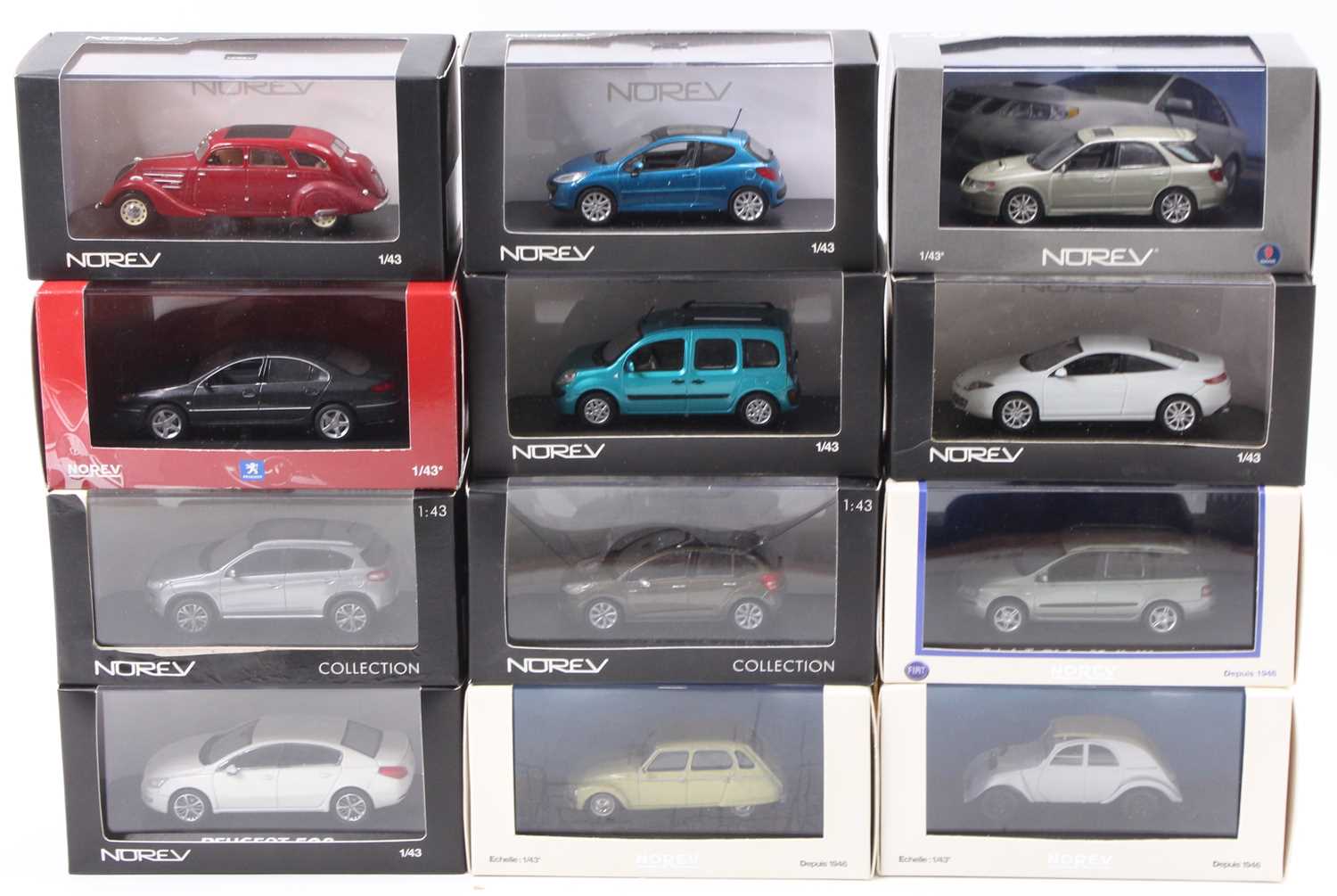 12 Norev 1/43rd scale diecasts, examples include No. 517745 Renault Laguna Coupe, No. 155273 Citroen