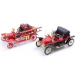 A Franklin Mint boxed diecast group to include a Ford Model T fire engine and an as found Stanley