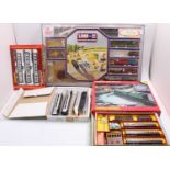 A collection of mixed 00 gauge boxed train sets, loose rolling stock and accessories to include a