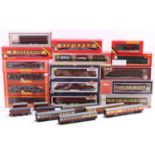 Tray containing a collection of various 00 gauge passenger stock and goods stock items to include