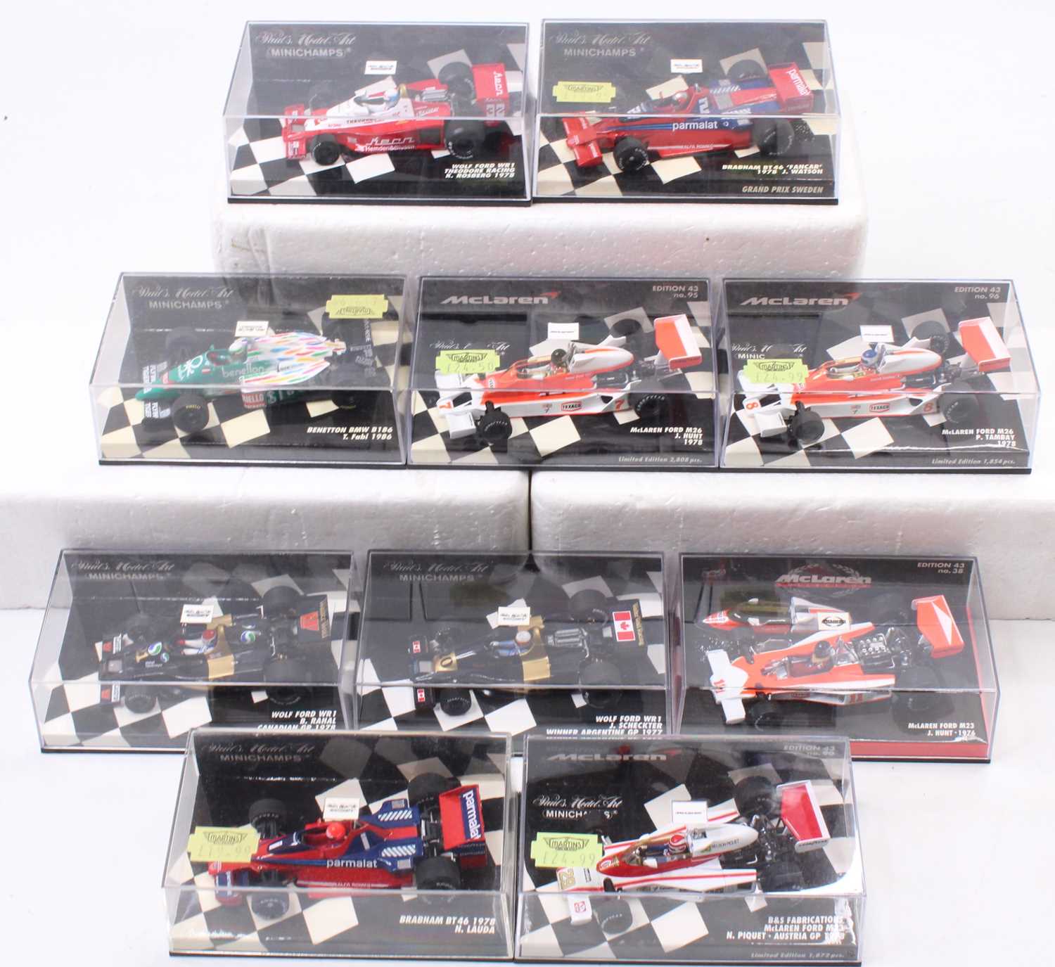 Ten plastic cased Minichamps 1/43 scale F1 racing diecasts, various examples to include a Wolf