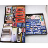 Three trays containing a good selection of mixed N gauge related lineside accessories, track,