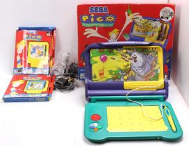 A Sega Pico children's electronic console housed in the original card box