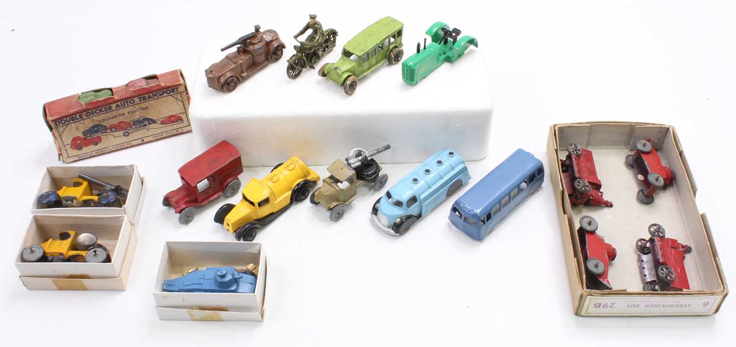 A collection of vintage diecasts including a John Hill & Co. Army Truck, 2x LondonToy model Buses,