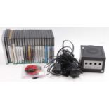 One tray containing a collection of various Nintendo Game Cube consoles and games to include The