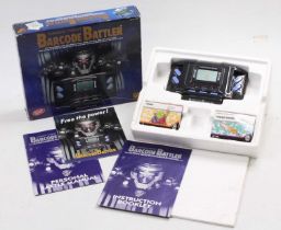 A Tomy 1992 Commence Conflict Barcode Battler (English version), housed in the original
