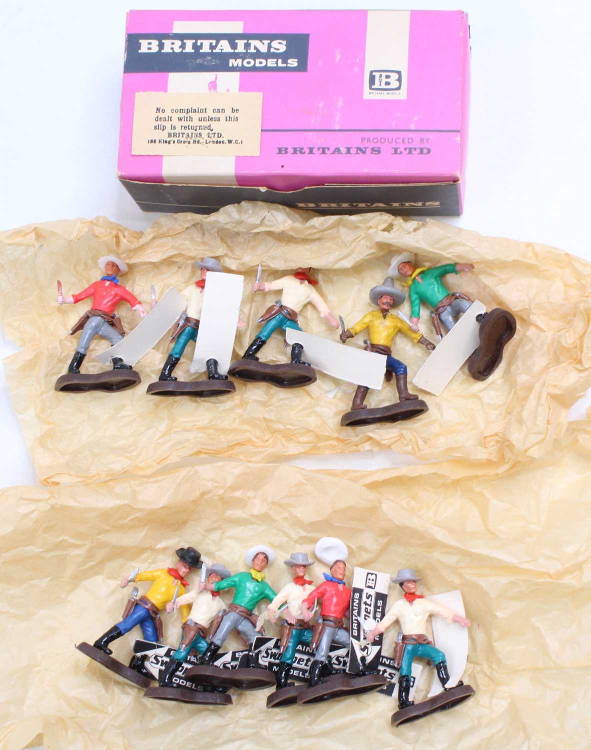 A Britains Swoppet series No. 659, 11 of 12 trade box of No. 659 knife fighter figures, housed in