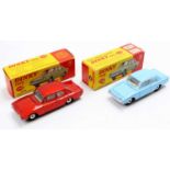 2 Dinky Toys No. 130 Ford Consul Corsair with the first comprising a pale blue body with white