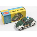 A Corgi Toys No. 492 Volkswagen European police car comprising of green and white body with spun