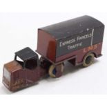 A Dinky Toys 33R LMS mechanical horse and box van trailer comprising of LMS brown and black