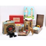 Two trays containing a collection of mixed vintage toys and collectables to include a Triang Play-