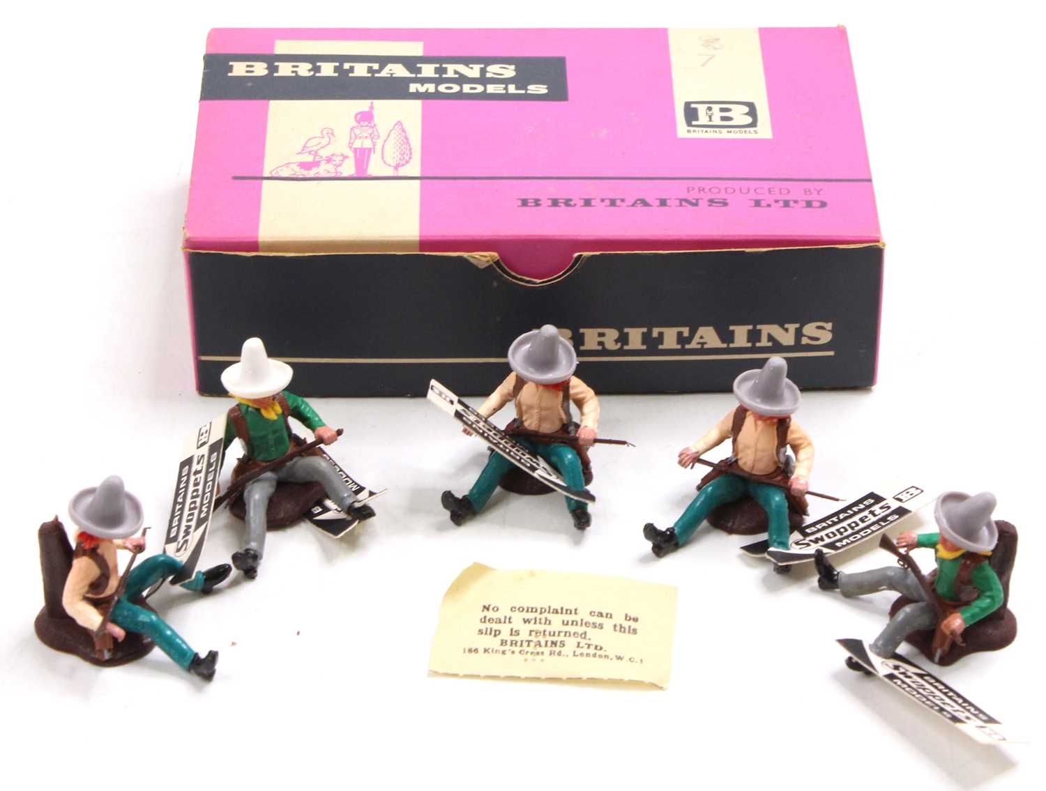 A Britains Swoppets incomplete trade box of 5 of 12, No. 658 Resting Cowboy figures, housed in the