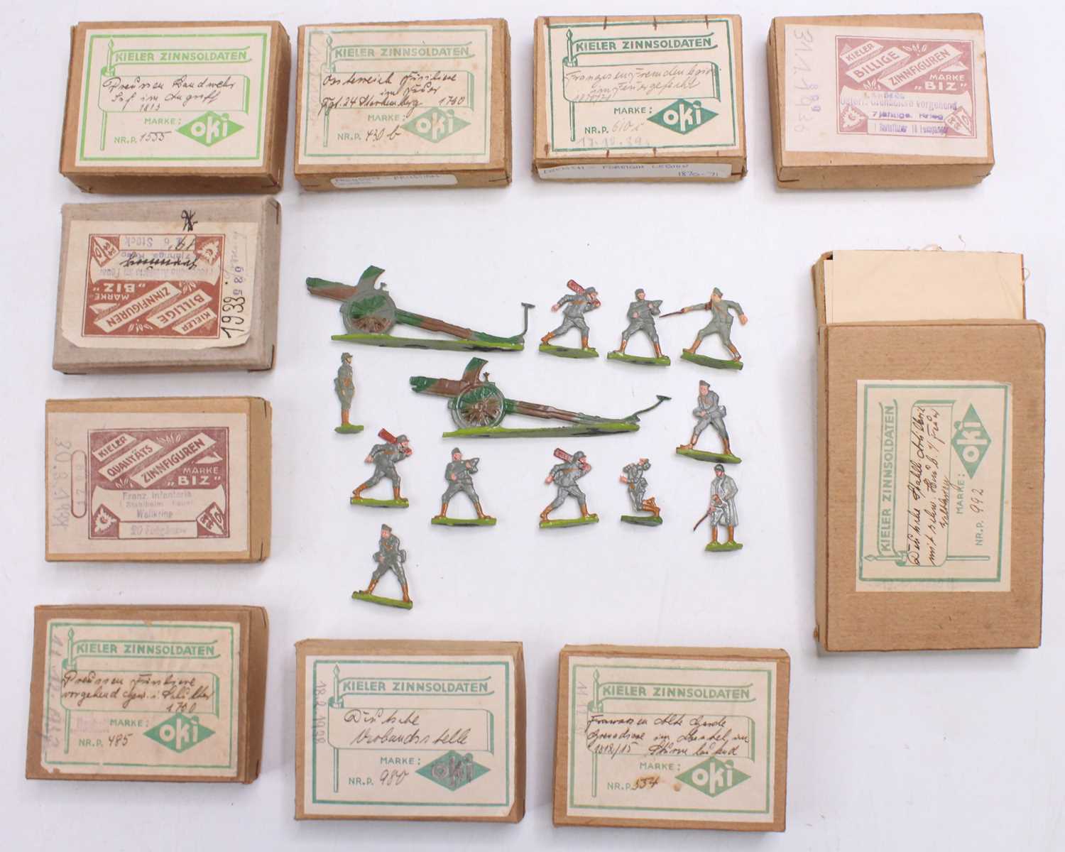 A collection of OKI Kieler Zinnsoldatan boxed lead flat figures, mixed various examples, to