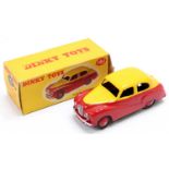 Dinky Toys No. 161 Austin Somerset saloon comprising of two tone red and yellow body with red
