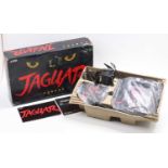 An Atari Jaguar 64-bit Interactive Multi Media console/gaming system housed in the original card box