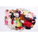 A collection of vintage 1970s Dolls including 3 Sindy Dolls, and others, with associated clothing