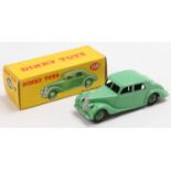 Dinky Toys No. 158 Riley saloon comprising of green body with matching hubs, the model has some