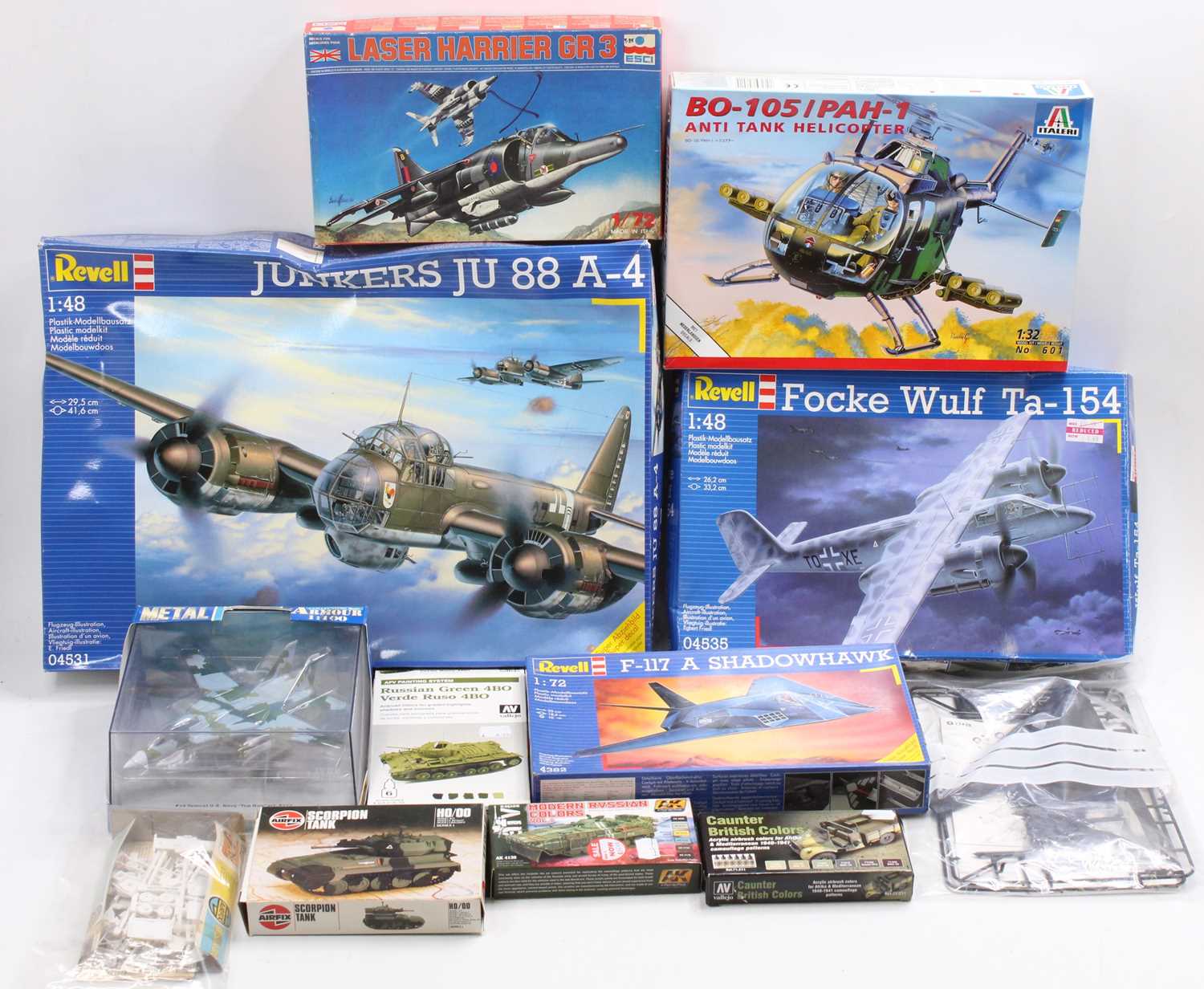 One box containing a large collection of mixed plastic kits, diecast aircraft, and associated kit