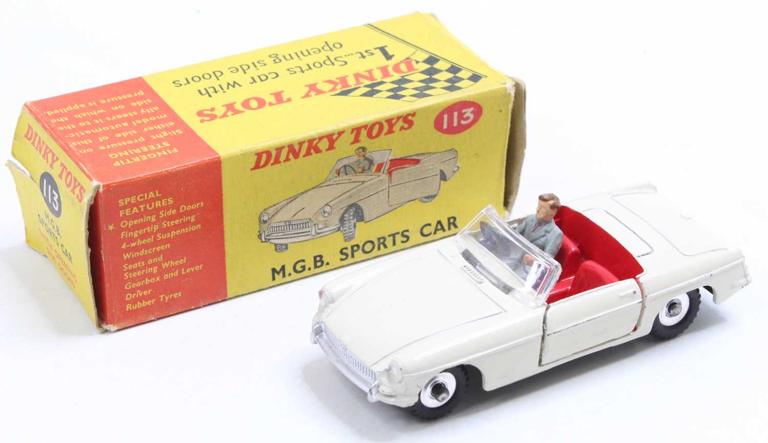 Dinky Toys No. 113 MGB sports car comprising cream body with red interior and driver figure, sold in