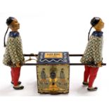 Lehmann Germany circa 1910 tinplate Tea Caddy comprising 2 standing/walking figures with patterned