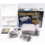 A Nintendo NES Challenge set, comprising of console, two control pads, start lead, and Super Mario 3