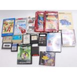 Two boxes containing a collection of mixed video games, cartridges, programmable software etc to