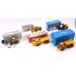 5 boxed 1/50th scale construction and earth moving diecast vehicles to include NZG Volvo A25C, a NZG
