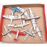 A collection of Dinky Toys aircraft, with examples including No. 62G Boeing Flying Fortress, No. 62P