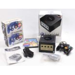 A collection of Game Cube PAL consoles to include a black example complete with controller, together