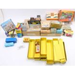 A box containing various mixed empty model boxes, specific examples to include a Majorette counter