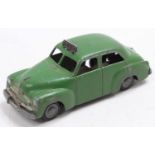 A Micro Models of Australia Holden Sedan Police Car comprising a green body with silver trim, ridged