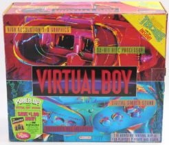 An original Nintendo Virtual Boy 32-bit console system housed in the original card box with inner