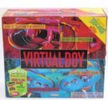 An original Nintendo Virtual Boy 32-bit console system housed in the original card box with inner