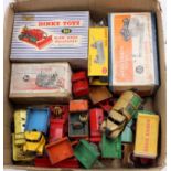 A tray containing a collection of Dinky Toys in play-worn condition with examples including a