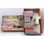 A group of Scalextric boxed raceway accessories, ephemera, Championship winning trophies, plastic