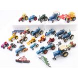 A collection of Britains, Corgi and Dinky model tractors, with specific examples including a