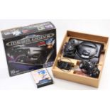 A Sega Mega Drive original boxed console comprising of console, power lead, two control pads, and