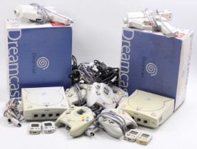 A large quantity of various Dreamcast part boxed consoles, power units, memory cards, hand guns,