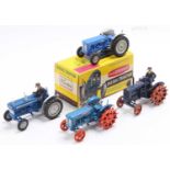 One box containing a collection of mixed boxed repainted and playworn Britains tractors to include a