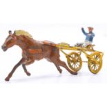 Taylor and Barrett, 2 wheel pony racing cart and jockey, comprising of yellow cart, jockey figure