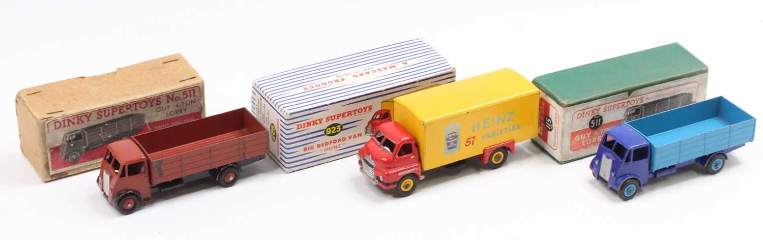 Dinky Toys boxed model group of 3 comprising 2x No. 511 Guy 4 Ton Lorry, one in two-tone blue (G),