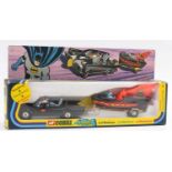 A Corgi gift set No. 3 Batmobile and Batboat comprising of gloss black Batmobile with Robin & Batman