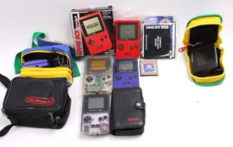 A collection of various boxed and loose Nintendo Game Boy related products to include a Nintendo