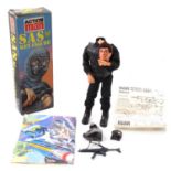 A Palitoy Action Man SAS Key Figure with uniform, weapon, and original Palitoy Action Man Poster,