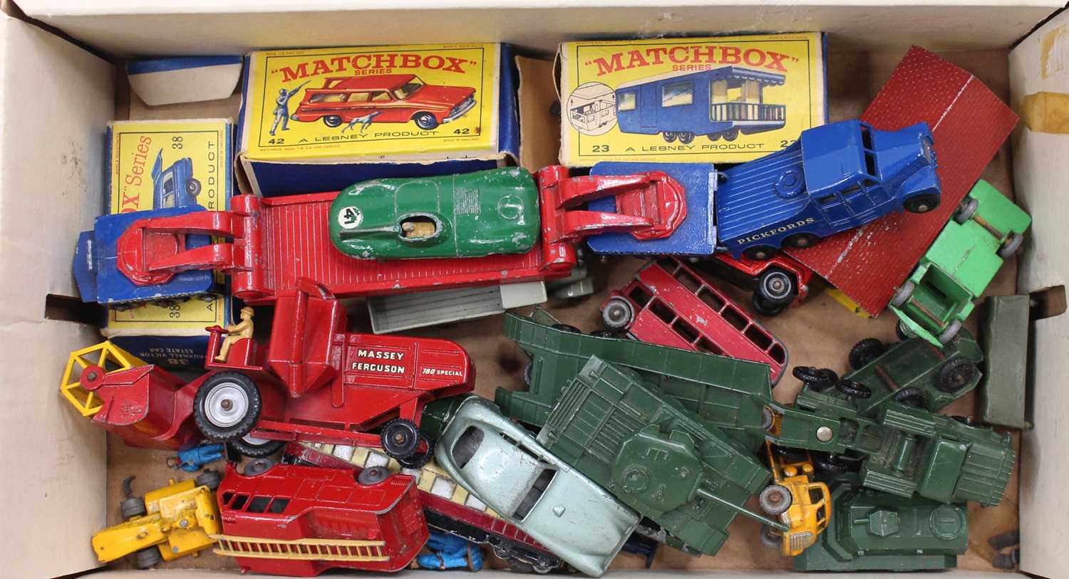 A tray containing a small collection of loose and boxed Matchbox Lesney diecast models, with